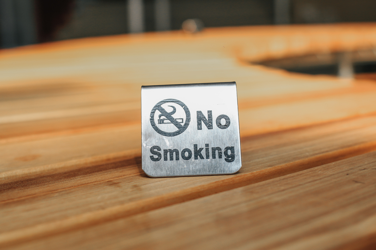 No Smoking Text on Wood